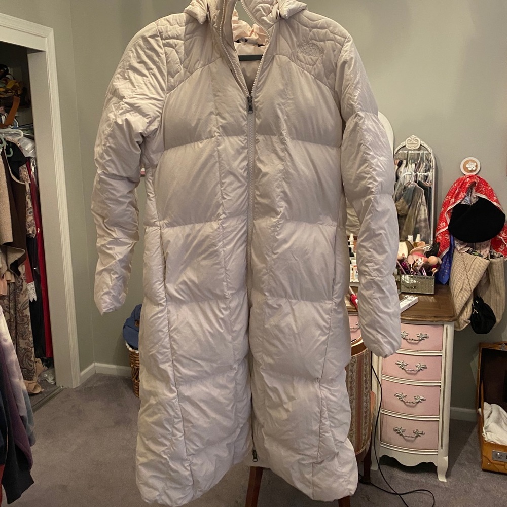 White long north face puffer jacket